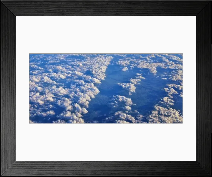 Framed Print : Aerial Cloudscape view over midwest states on flight over Colorado Framed Print : Aerial Cloudscape view over midwest states on flight over Colorado