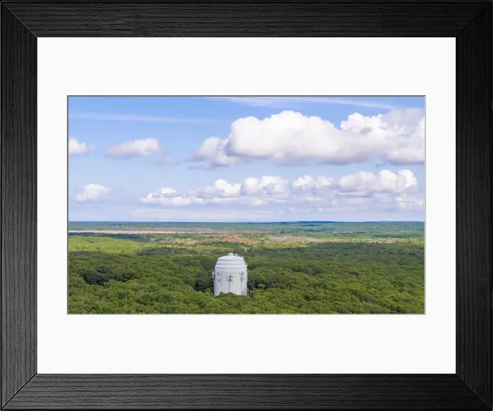 Framed Print : Aerial view of a large white water tower in Sag Harbor, NY