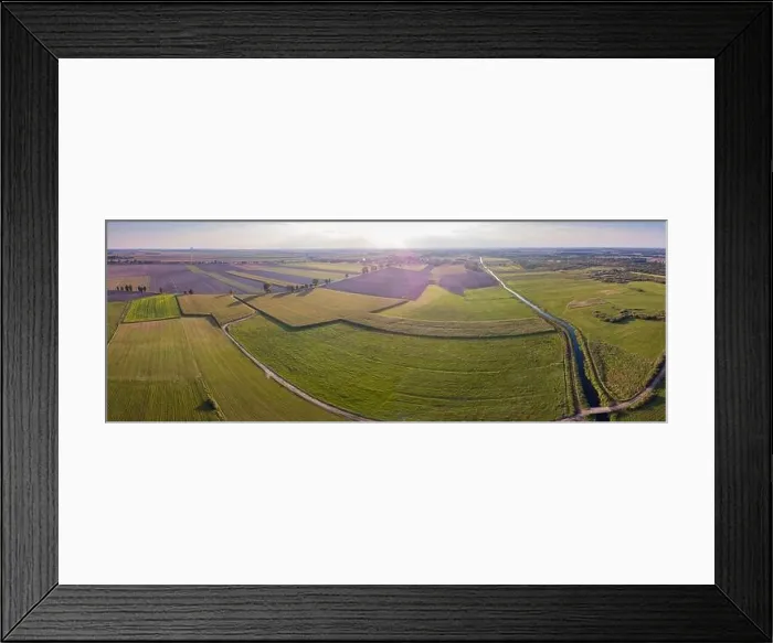 Framed Print : Aerial: FIelds and windmills in sunset light. Drone view Framed Print : Aerial: FIelds and windmills in sunset light. Drone view
