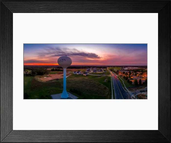 Framed Print : Maryland sunset with water tower and new construction upper middle class neighborhood in new USA real estate development Framed Print : Maryland sunset with water tower and new construction upper middle class neighborhood in new USA real estate development