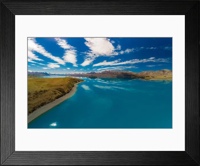 Framed Print : Aerial drone shots of beautiful Lake Tekapo with reflection of sky and mountains, New Zealand Framed Print : Aerial drone shots of beautiful Lake Tekapo with reflection of sky and mountains, New Zealand