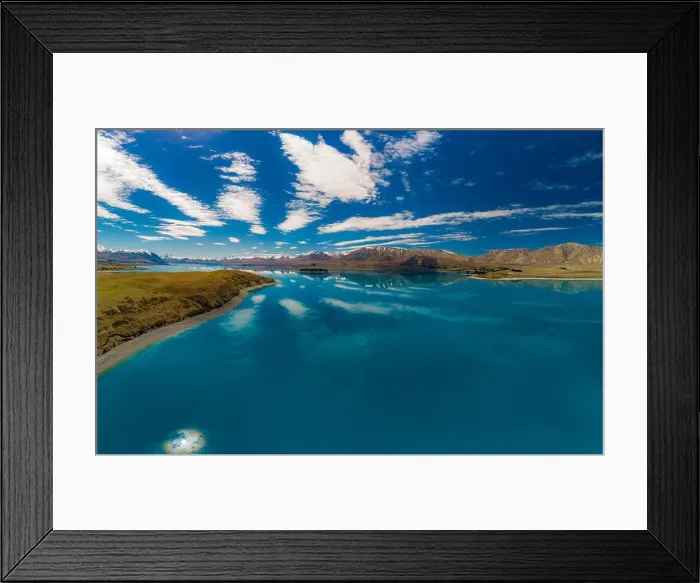 Framed Print : Aerial drone shots of beautiful Lake Tekapo with reflection of sky and mountains, New Zealand Framed Print : Aerial drone shots of beautiful Lake Tekapo with reflection of sky and mountains, New Zealand