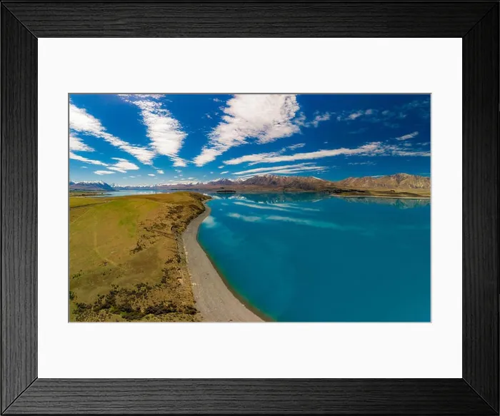Framed Print : Aerial drone shots of beautiful Lake Tekapo with reflection of sky and mountains, New Zealand Framed Print : Aerial drone shots of beautiful Lake Tekapo with reflection of sky and mountains, New Zealand