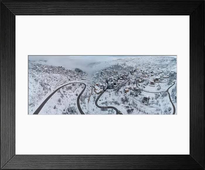 Framed Print : Aerial View of Seli Traditional Greek Village Covered by Snow in Winter Morning Framed Print : Aerial View of Seli Traditional Greek Village Covered by Snow in Winter Morning
