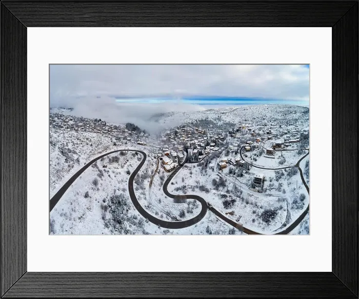 Framed Print : Aerial View of Seli Traditional Greek Village Covered by Snow in Winter Morning Framed Print : Aerial View of Seli Traditional Greek Village Covered by Snow in Winter Morning