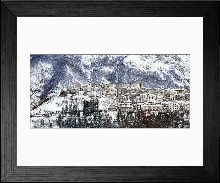 Framed Print : Aerial view of the beautiful snow-covered village of Opi with snow-capped mountains in the background