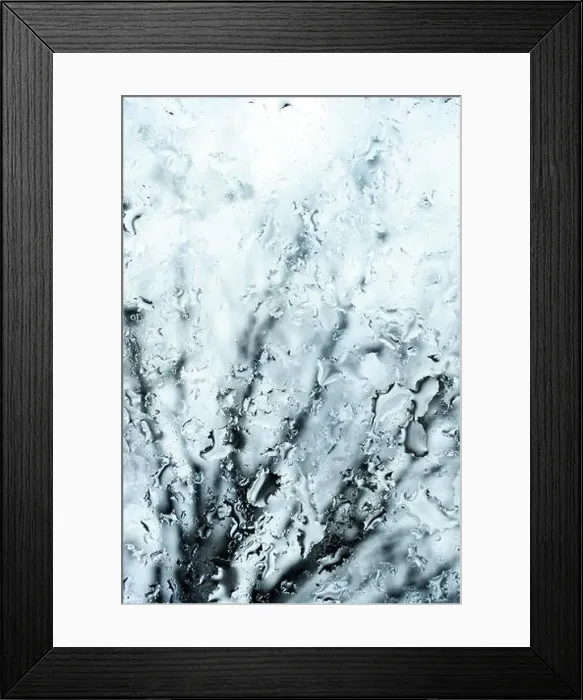 Framed Print : (selective focus) Close-up view of some drops of water on a glass during a rainy day Framed Print : (selective focus) Close-up view of some drops of water on a glass during a rainy day