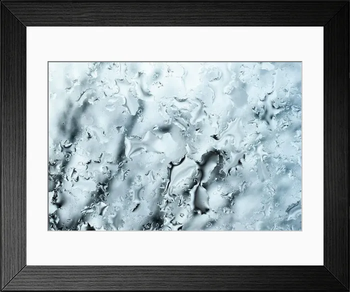 Framed Print : (selective focus) Close-up view of some drops of water on a glass during a rainy day Framed Print : (selective focus) Close-up view of some drops of water on a glass during a rainy day