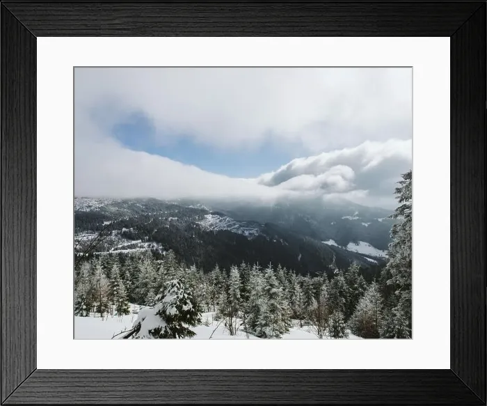 Framed Print : Drone view of snowy Black Forest mountains in Mummelsee, Germany Framed Print : Drone view of snowy Black Forest mountains in Mummelsee, Germany