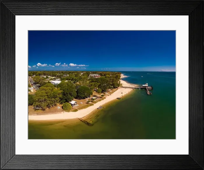 Framed Print : Aerial drone view of Bongaree Jetty on Bribie Island, Sunshine Coast, Queensland, Australia Framed Print : Aerial drone view of Bongaree Jetty on Bribie Island, Sunshine Coast, Queensland, Australia