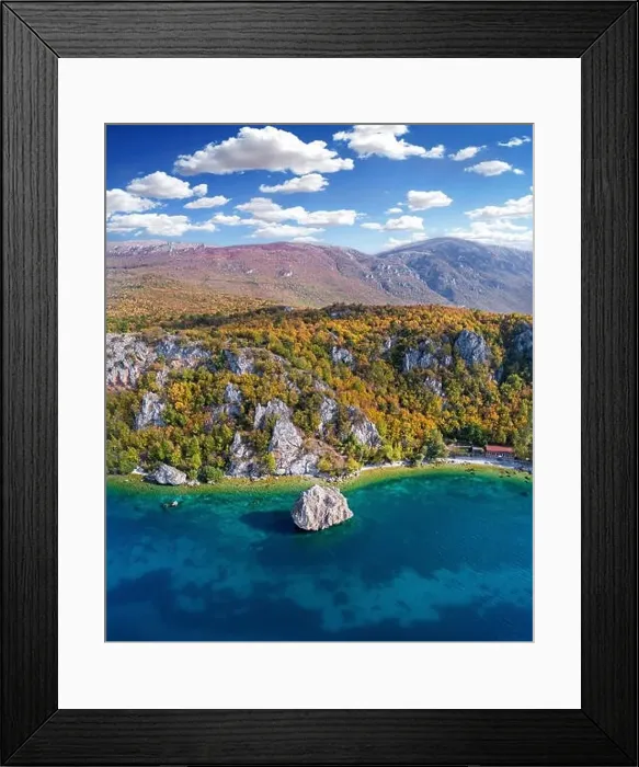 Framed Print : Ohrid Lake and Tarpeica little city in Macedonia with big rock in the lake - drone photography