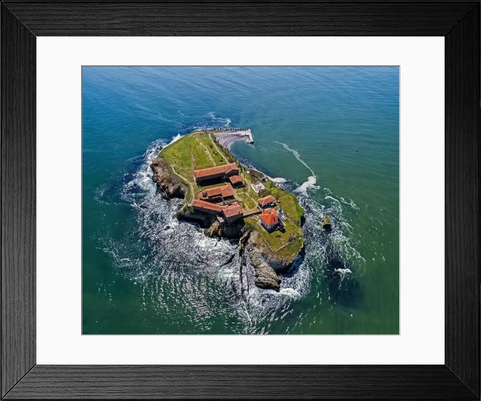Framed Print : Saint Anastasia Island in Burgas bay, Black Sea, Bulgaria. Lighthouse tower and old wooden buildings on rocky coast Framed Print : Saint Anastasia Island in Burgas bay, Black Sea, Bulgaria. Lighthouse tower and old wooden buildings on rocky coast