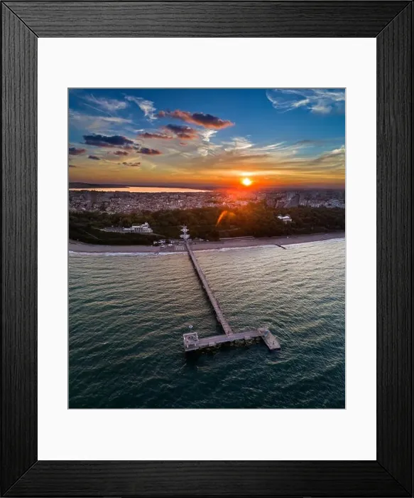 Framed Print : Sea garden at sunset, in the background, downtown Burgas, bulgaria.Вith the bridge Framed Print : Sea garden at sunset, in the background, downtown Burgas, bulgaria.Вith the bridge