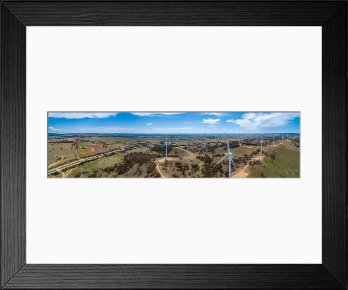 Framed Print : Wide aerial panorama of Hume Highway and wind farm in beautiful Australian countryside. Breadalbane, NSW, Australia Framed Print : Wide aerial panorama of Hume Highway and wind farm in beautiful Australian countryside. Breadalbane, NSW, Australia