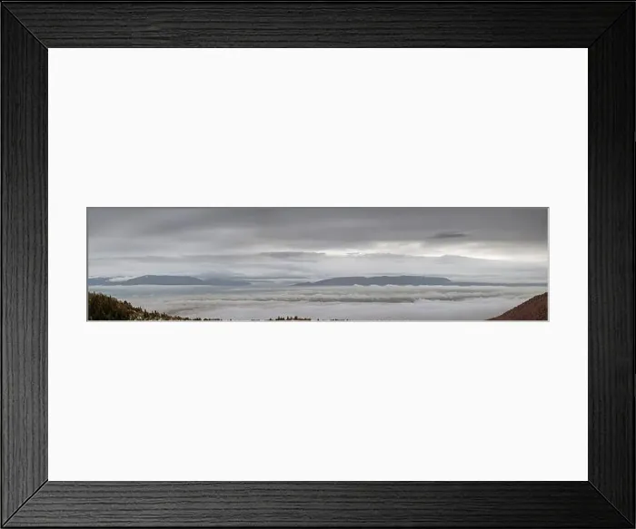 Framed Print : A cloudy, misty landscape can be seen rising through the low clouds Framed Print : A cloudy, misty landscape can be seen rising through the low clouds