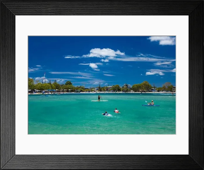 Framed Print : Gold Coast, AUS - JAN 12 2019: People enjoying beach activities at famous family beach at Tallebudgera Creek Gold Coast Framed Print : Gold Coast, AUS - JAN 12 2019: People enjoying beach activities at famous family beach at Tallebudgera Creek Gold Coast