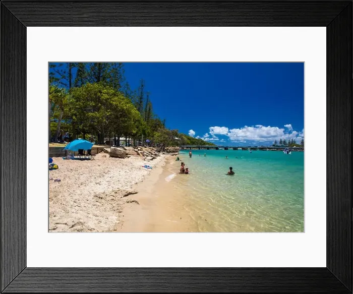Framed Print : Gold Coast, AUS - JAN 12 2019: People enjoying beach activities at famous family beach at Tallebudgera Creek Gold Coast
