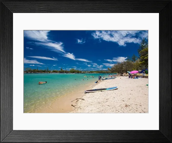 Framed Print : Gold Coast, AUS - JAN 12 2019: People enjoying beach activities at famous family beach at Tallebudgera Creek Gold Coast Framed Print : Gold Coast, AUS - JAN 12 2019: People enjoying beach activities at famous family beach at Tallebudgera Creek Gold Coast
