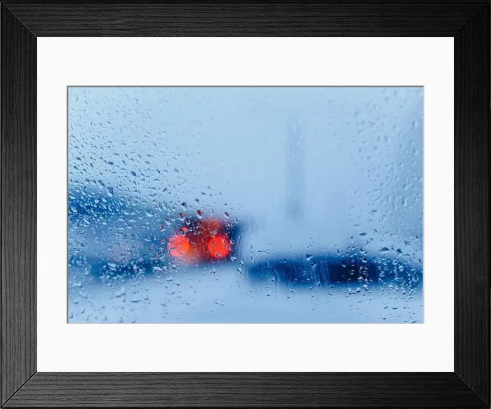 Framed Print : Traffic abstract in rain. Traffic seen from inside a car. Rain drops on windshield and car tail lights in bokeh Framed Print : Traffic abstract in rain. Traffic seen from inside a car. Rain drops on windshield and car tail lights in bokeh