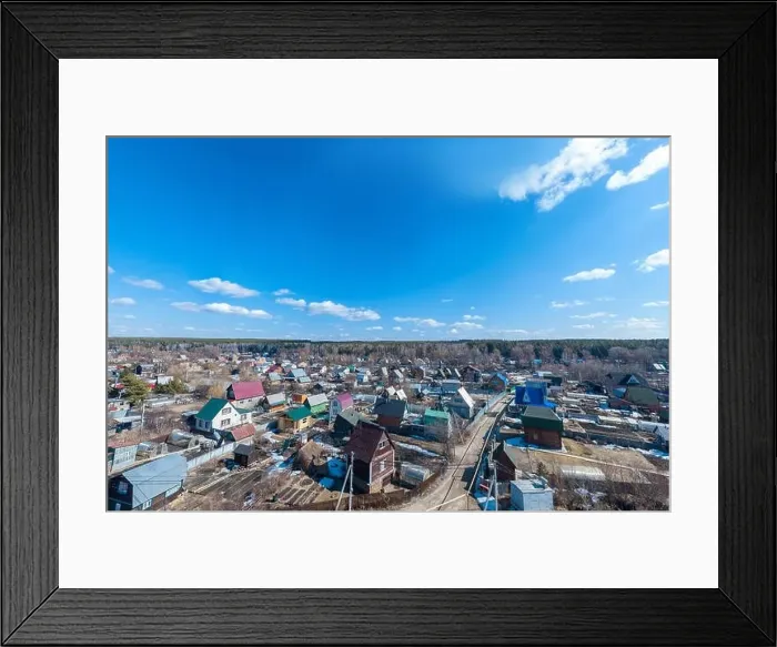 Framed Print : Aerial drone view of an old traditiona village in the forest, on background bly sky Framed Print : Aerial drone view of an old traditiona village in the forest, on background bly sky