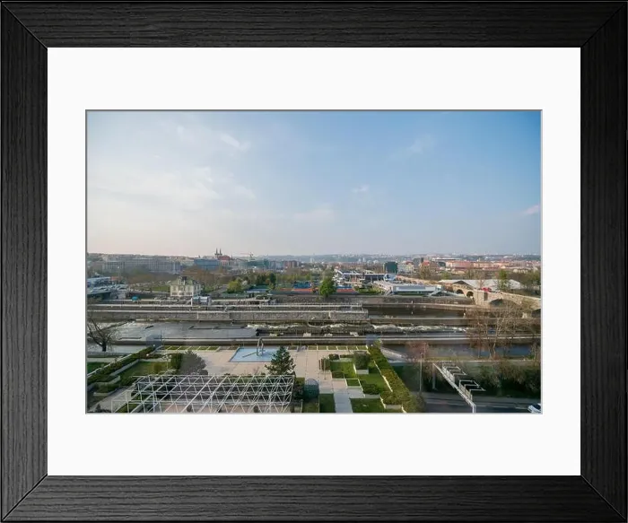 Framed Print : PRAGUE, CZECHIA - 9TH APRIL 2019: Daytime aerial drone view of Prague with it's famous bridges and river Framed Print : PRAGUE, CZECHIA - 9TH APRIL 2019: Daytime aerial drone view of Prague with it's famous bridges and river
