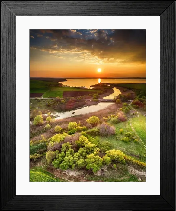 Framed Print : Beautiful landscape with fiery sunset over the lake and river near Burgas, Bulgaria. Aerial view Framed Print : Beautiful landscape with fiery sunset over the lake and river near Burgas, Bulgaria. Aerial view