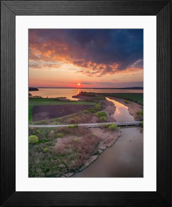 Framed Print : Beautiful landscape with fiery sunset over the lake and river near Burgas, Bulgaria. Aerial view Framed Print : Beautiful landscape with fiery sunset over the lake and river near Burgas, Bulgaria. Aerial view