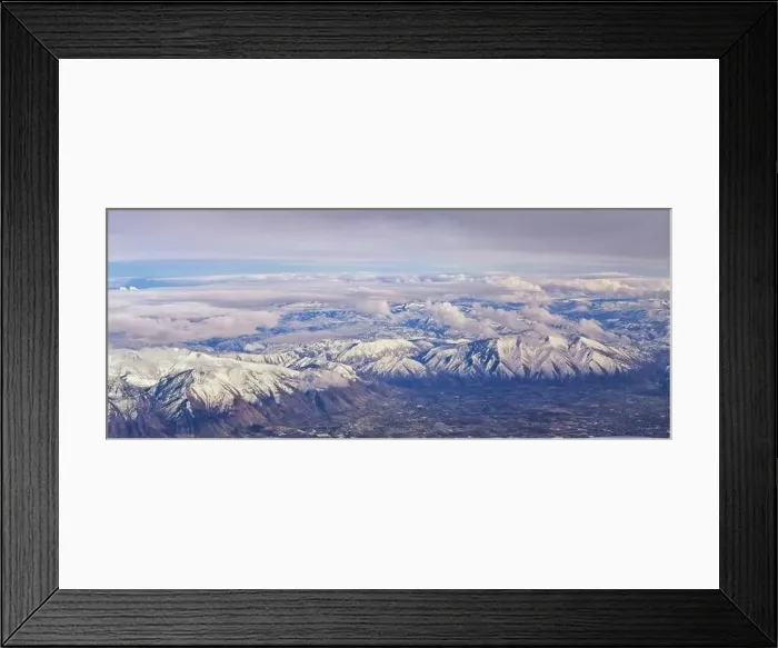 Framed Print : Aerial view from airplane of the Wasatch Front Rocky Mountain Range with snow capped peaks in winter including urban