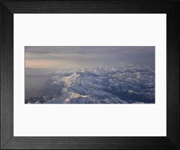 Framed Print : Aerial view from airplane of the Wasatch Front Rocky Mountain Range with snow capped peaks in winter including urban