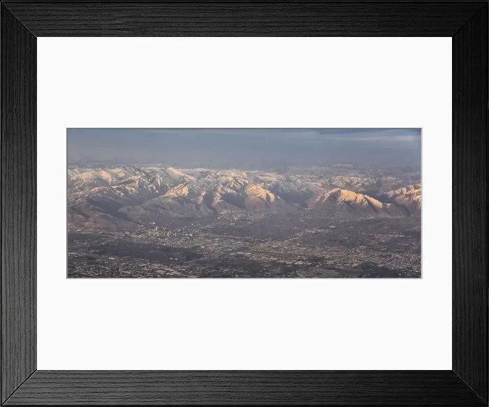 Framed Print : Aerial view from airplane of the Wasatch Front Rocky Mountain Range with snow capped peaks in winter including urban Framed Print : Aerial view from airplane of the Wasatch Front Rocky Mountain Range with snow capped peaks in winter including urban