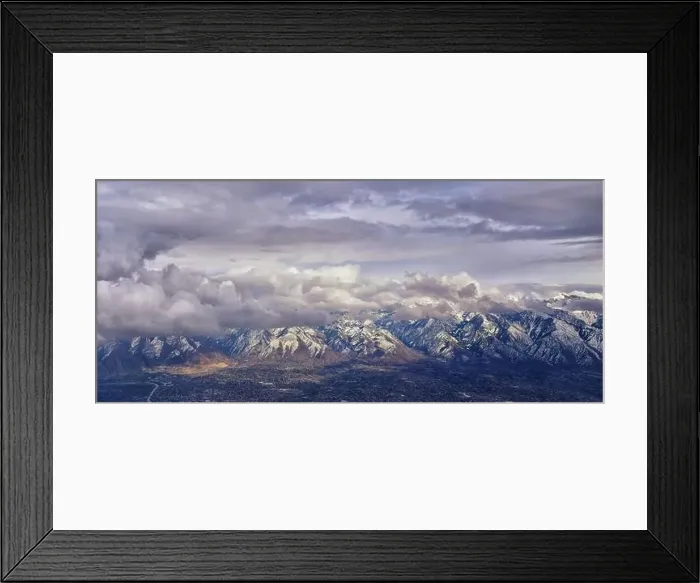 Framed Print : Aerial view from airplane of the Wasatch Front Rocky Mountain Range with snow capped peaks in winter including urban