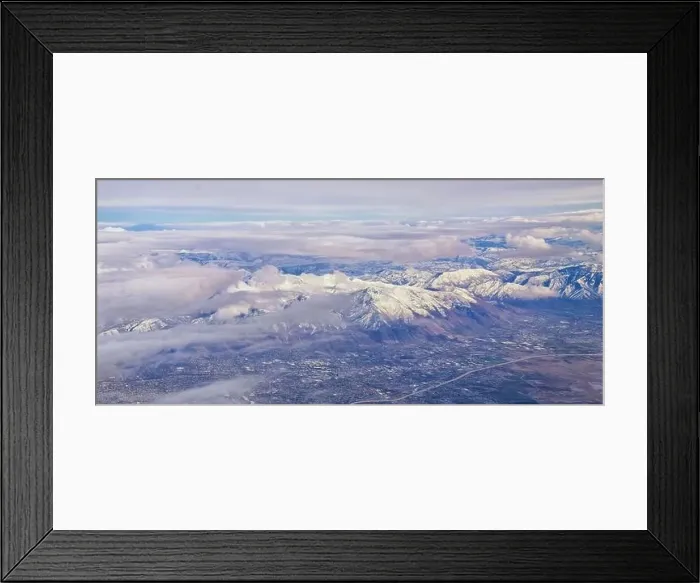 Framed Print : Aerial view from airplane of the Wasatch Front Rocky Mountain Range with snow capped peaks in winter including urban Framed Print : Aerial view from airplane of the Wasatch Front Rocky Mountain Range with snow capped peaks in winter including urban