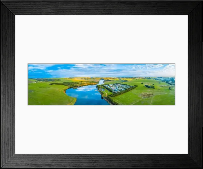 Framed Print : Wide aerial panorama of Hopkins River, Holiday Park and surrounding agricultural land in Warrnambool, Australia Framed Print : Wide aerial panorama of Hopkins River, Holiday Park and surrounding agricultural land in Warrnambool, Australia