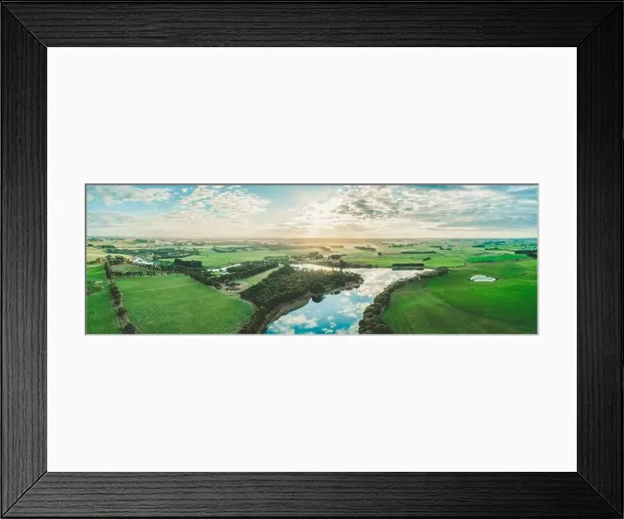 Framed Print : Wide aerial panorama of sunset over Hopkins River and grasslands in Warrnambool, Australia Framed Print : Wide aerial panorama of sunset over Hopkins River and grasslands in Warrnambool, Australia