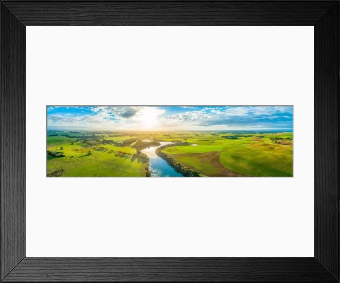 Framed Print : Aerial panoramic landscape of scenic sunset over river and grasslands in Australia Framed Print : Aerial panoramic landscape of scenic sunset over river and grasslands in Australia