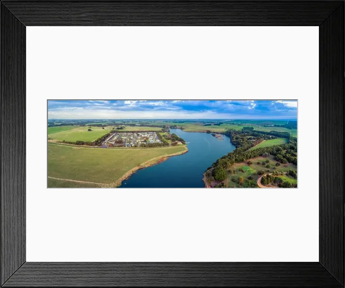 Framed Print : Aerial panorama of Hopkins River and holiday park surrounded by grasslands Framed Print : Aerial panorama of Hopkins River and holiday park surrounded by grasslands