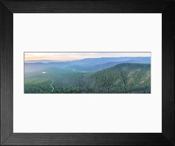 Framed Print : Mountains and eucalyptus forest at dusk - aerial panoramic landscape Framed Print : Mountains and eucalyptus forest at dusk - aerial panoramic landscape