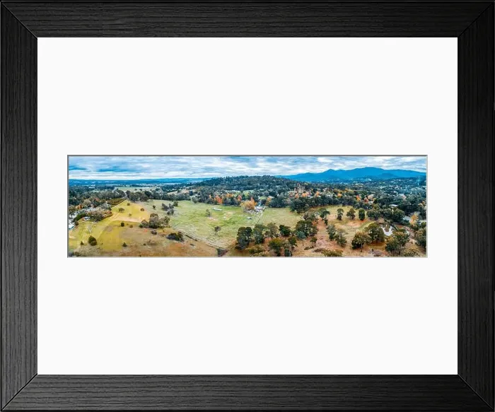 Framed Print : Aerial panoramic landscape of scenic countryside and mountains in Australia in autumn Framed Print : Aerial panoramic landscape of scenic countryside and mountains in Australia in autumn