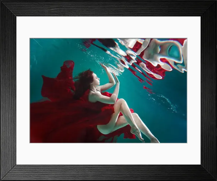 Framed Print : Mystical underwater portrait of a beautiful young woman in a red dress