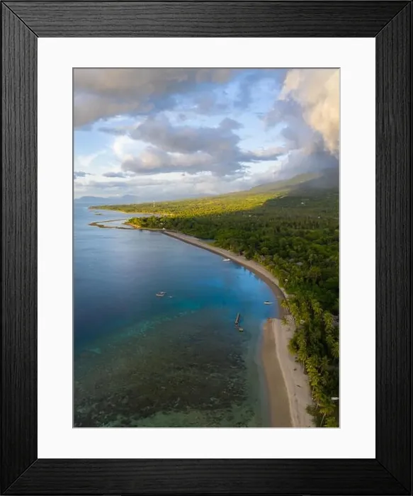 Framed Print : Clouds drift over the scenic coastline of Flores, Indonesia. This large island is surrounded by vibrant coral reefs Framed Print : Clouds drift over the scenic coastline of Flores, Indonesia. This large island is surrounded by vibrant coral reefs