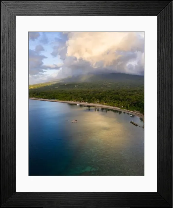 Framed Print : Clouds drift over the scenic coastline of Flores, Indonesia. This large island is surrounded by vibrant coral reefs Framed Print : Clouds drift over the scenic coastline of Flores, Indonesia. This large island is surrounded by vibrant coral reefs