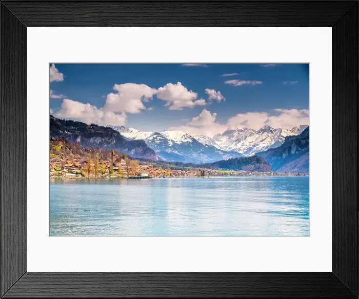 Framed Print : Brienz town on lake Brienz by Interlaken with the Swiss Alps covered by snow in the background, Switzerland, Europe Framed Print : Brienz town on lake Brienz by Interlaken with the Swiss Alps covered by snow in the background, Switzerland, Europe