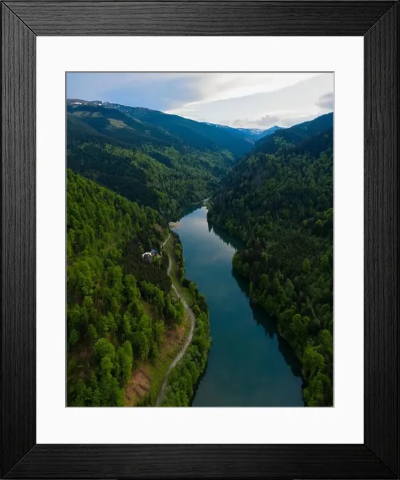Framed Print : Aerial drone shot of a lake and green forest in Transylvania, Romania Framed Print : Aerial drone shot of a lake and green forest in Transylvania, Romania