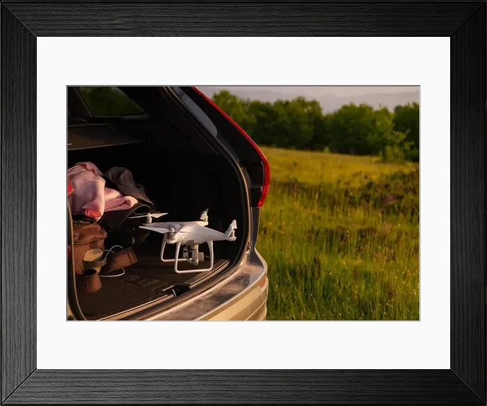 Framed Print : drone ready for fly in suv trunk landscape nature mountains sunset Framed Print : drone ready for fly in suv trunk landscape nature mountains sunset