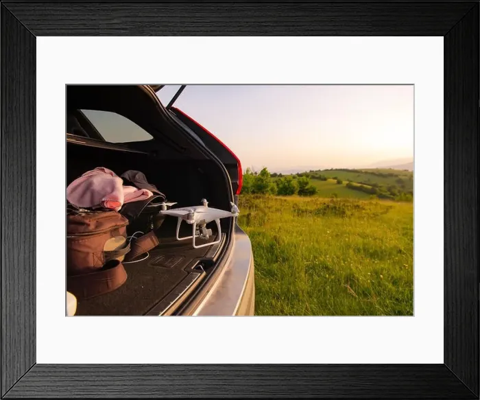Framed Print : drone ready for fly in suv trunk landscape nature mountains sunset Framed Print : drone ready for fly in suv trunk landscape nature mountains sunset