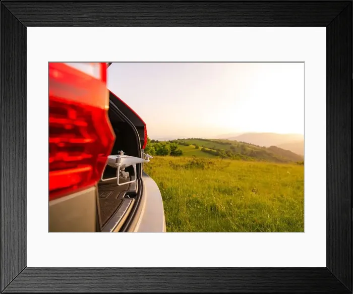Framed Print : drone ready for fly in suv trunk landscape nature mountains sunset Framed Print : drone ready for fly in suv trunk landscape nature mountains sunset