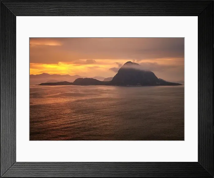 Framed Print : Rock Hessa nearby Alesund / Norway in the ocean with clouds in sunrise Framed Print : Rock Hessa nearby Alesund / Norway in the ocean with clouds in sunrise