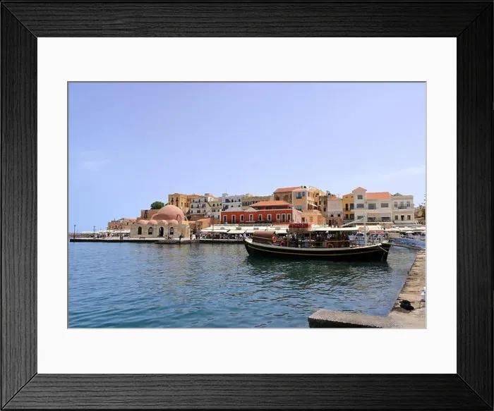 Framed Print : Excursion boat cruising Venetian harbour and mediterranean sea of Chania, Crete, Greece Framed Print : Excursion boat cruising Venetian harbour and mediterranean sea of Chania, Crete, Greece
