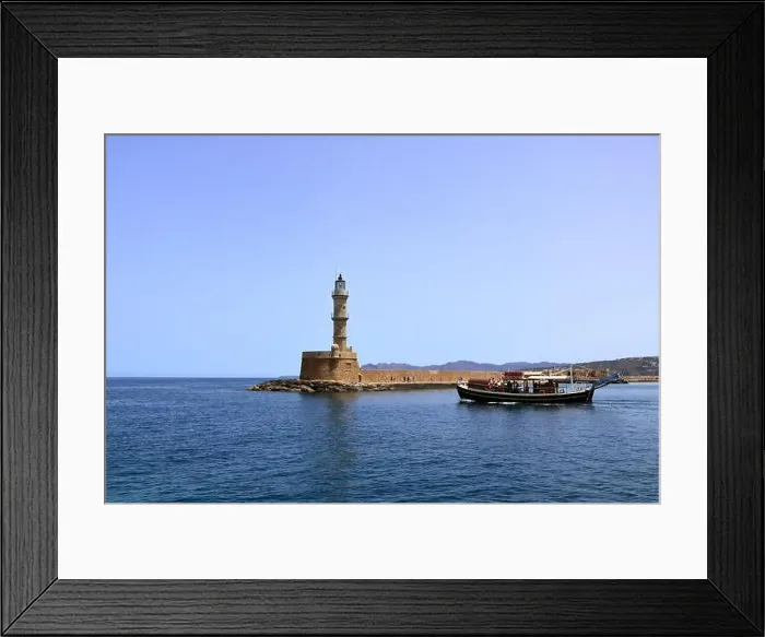 Framed Print : Excursion boat cruising Venetian harbour and mediterranean sea of Chania, Crete, Greece Framed Print : Excursion boat cruising Venetian harbour and mediterranean sea of Chania, Crete, Greece