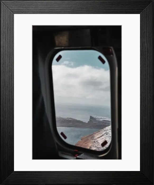 Framed Print : Aerial view onto iconic Sorvagsvatn Lake with snow-covered cliffs during a helicopter flight over the island Vagar in Framed Print : Aerial view onto iconic Sorvagsvatn Lake with snow-covered cliffs during a helicopter flight over the island Vagar in